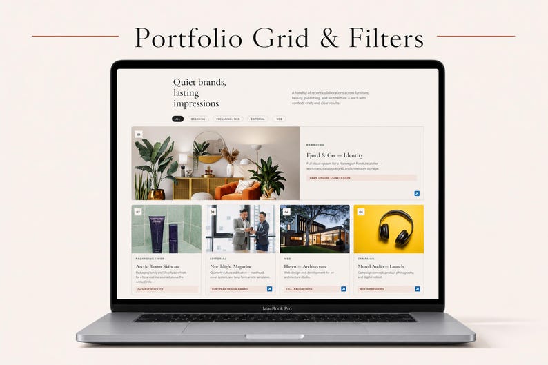 May include: A laptop screen displaying a website interface titled Portfolio Grid & Filters. The page features a header with the text Quiet brands, lasting impressions, followed by a grid of project thumbnails including interior design, skincare, architecture, and audio equipment.