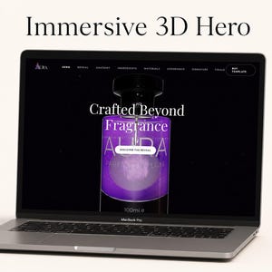May include: A silver laptop displaying a website titled Immersive 3D Hero. The screen shows a purple perfume bottle with the text Crafted Beyond, Fragrance AURA, and 100ml e. The navigation bar includes links like Hero, Reveal, Anatomy, and Buy Template.