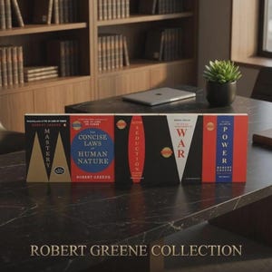 May include: A collection of five books by Robert Greene arranged in a row on a black marble table. The titles include Mastery, The Concise Laws of Human Nature, Seduction, War, and Power. Each book features a distinct geometric cover design.