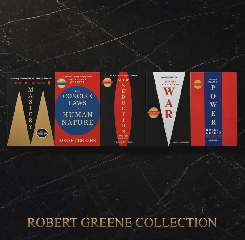 May include: A collection of five books by Robert Greene, including Mastery, The Concise Laws of Human Nature, The Art of Seduction, The 33 Strategies of War, and The 48 Laws of Power. The book covers feature bold geometric designs in black, red, gold, and white.