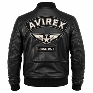 May include: A black leather bomber jacket featuring a ribbed collar, cuffs, and hem. The back displays a large embroidered patch with the text AVIREX in white, a winged star emblem, and a rectangular patch below reading SINCE 1975 in white.