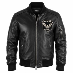 May include: A black leather bomber jacket featuring a ribbed collar, cuffs, and hem. The front includes a central silver zipper, two side pockets with snap closures, and a patch on the left chest displaying an eagle emblem and the text AVIREX.
