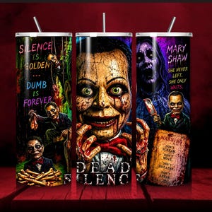 May include: A cylindrical tumbler featuring a horror-themed graphic with a ventriloquist dummy, the text Silence is Golden Dumb is Forever, Mary Shaw, and a warning sign that reads Don't Scream, Don't Move, Don't Breathe, Don't Speak with a straw.