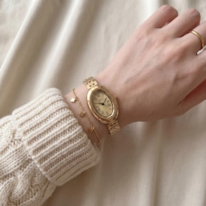 Orologio ovale dorato da donna, orologio da polso vintage con quadrante a numeri romani, bracciale classico regolabile a maglie, elegante orologio al quarzo, regalo perfetto per lei.
