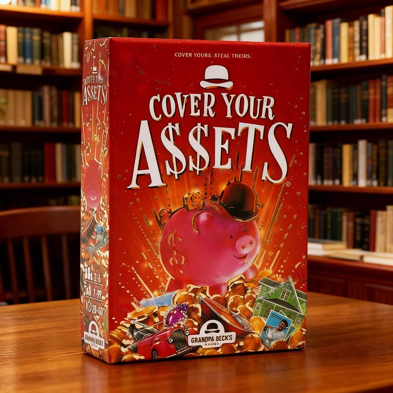 May include: A rectangular board game box titled Cover Your Assets with a red background. The front features a pink piggy bank wearing a black bowler hat, surrounded by gold coins, a red car, a house, and a portrait. Text reads Cover Your Assets.