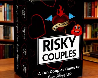 May include: A black rectangular game box titled Risky Couples with a red heart graphic featuring blue wings and flames. The box displays text including Cards 150, Players 2+, Age 21+, and Time 30+ Mins, along with the phrase A Fun Couples Game to Spice Things UP.