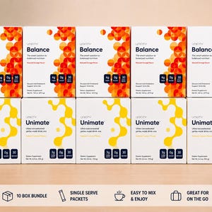 Könnte beinhalten: Ein Zehner-Set Unicity Nahrungsergänzungsmittel, angeordnet in zwei Reihen. Die obere Reihe zeigt fünf Packungen Balance mit orangefarbenen geometrischen Mustern, während die untere Reihe fünf Packungen Unimate mit gelben abstrakten Designs enthält.