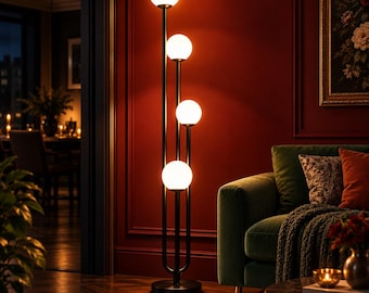 May include: A tall floor lamp featuring a slender black metal frame with four vertical poles of varying heights. Each pole is topped with a spherical white glass globe light, creating a tiered arrangement of illuminated orbs in a vertical line.