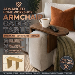 May include: A dark wood armchair caddy table with a rounded end, resting on a sofa arm. The table features a white mug and a black remote control on its surface. A diagram shows dimensions of 45.7 cm by 18.4 cm by 32.4 cm by 25.4 cm.