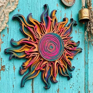 May include: A multi-layered wooden wall art piece shaped like a sun with a central spiral. The design features vibrant, gradient colors including shades of teal, magenta, orange, and yellow, with intricate, flame-like rays extending outward.