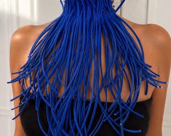 May include: A vibrant blue choker necklace constructed from numerous thin, flexible, cord-like strands that drape downward from the neck, creating a dense, layered fringe effect that covers the upper chest area in a cascading, textured pattern.