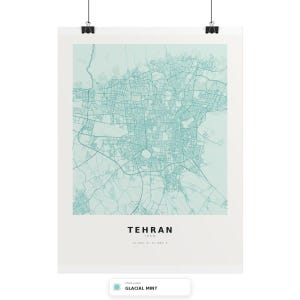 May include: A vertical wall art print featuring a detailed street map of Tehran, Iran, rendered in a glacial mint green color against a light background. The text TEHRAN IRAN is printed in black below the map, followed by geographic coordinates.