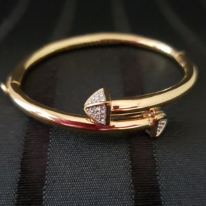 Vintage Juicy Couture bracelet. Juicy Pave CZ Gold Ton Juicy bracelet.  Crystal Juicy Bangle bracelet. Modern Juicy Couture Jewelry