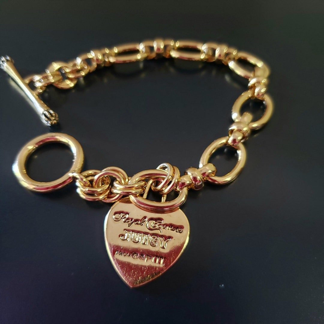 Juicy Couture Heart Bracelet. Juicy Couture Gold Ton Bracelet