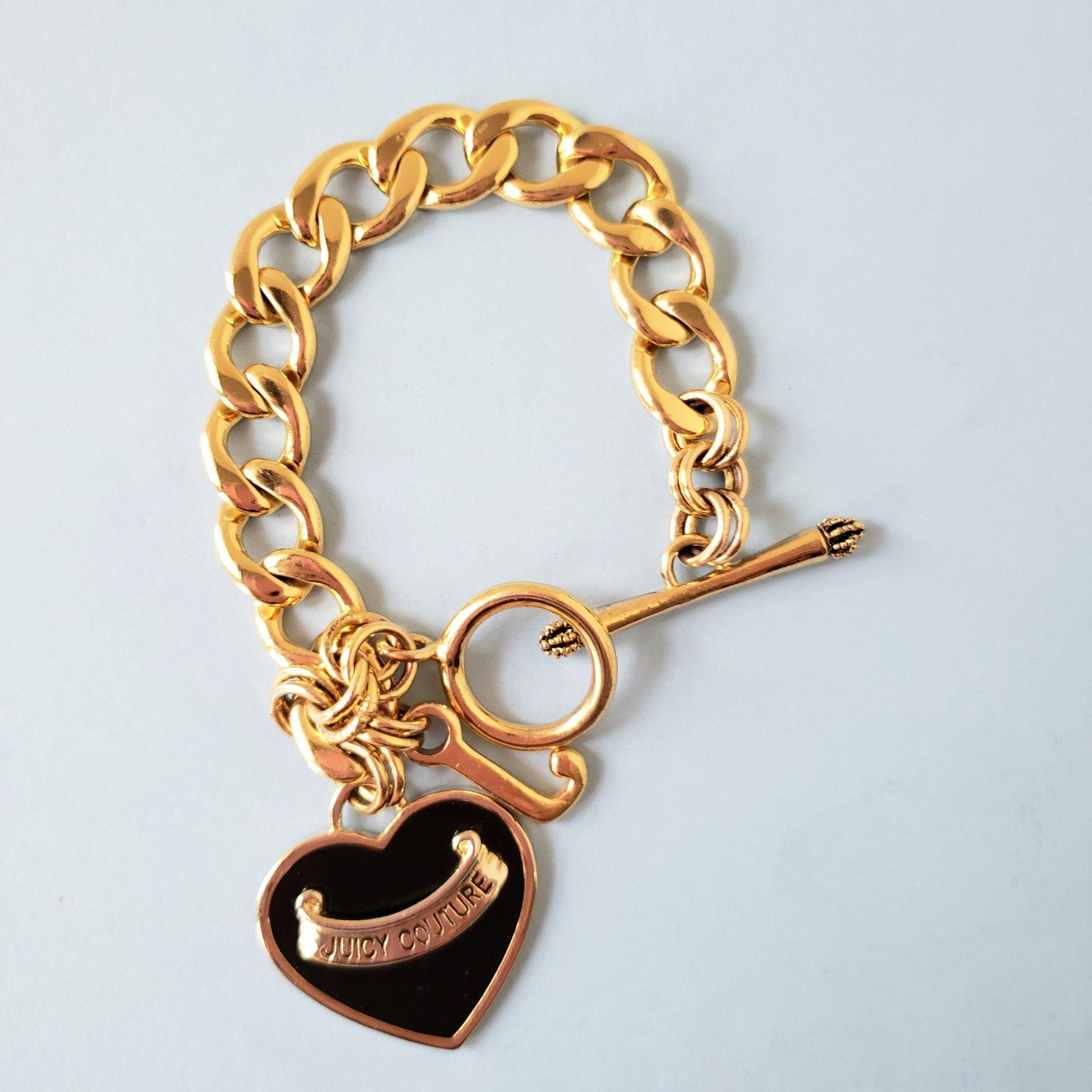 Juicy Couture Heart Bracelet. Juicy Couture Gold Ton Bracelet