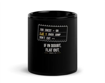 May include: A black ceramic mug featuring white rally racing pace notes that read 100 CREST > 6R, FLAT !! OVER JUMP, DON'T CUT <<, followed by the text IF IN DOUBT, FLAT OUT. and the brand name TORQUE & TIN at the bottom.