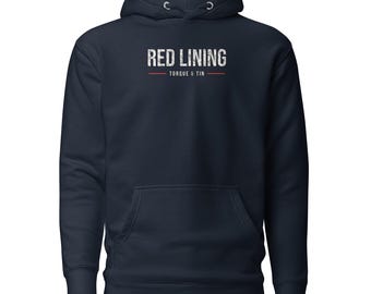 May include: A navy blue hooded sweatshirt featuring a front kangaroo pocket and long sleeves. The chest displays the white distressed text RED LINING above the smaller white text TORQUE & TIN, separated by two thin horizontal red lines.