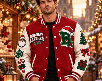 May include: A red and white varsity jacket featuring embroidered patches of Santa Claus, a candy cane, a snowflake, a Christmas tree, a gift, a bow, and the text Bombay Leather and B. The jacket has a button-front closure and striped ribbed trim.