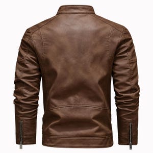 Men’s sheepskin leather motorcycle jacket with stand collar, zipper pockets, metal hardware, soft fleece lining, and timeless retro biker styling.
#MensLeather #BikerJacket #MotoJacket #Sheepskin #LeatherCoat #MensCoat #RetroMoto #RiderStyle #BrownLeather #WinterWear #MensFashion #BikerWear #MotoWear #WarmCoat #LeatherStyle #StandCollar #MensGift #RiderJacket #WinterStyle #Outerwear