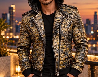 May include: A hooded leather jacket featuring a metallic gold and black crocodile skin texture, silver-tone zippers, epaulets, and black ribbed cuffs. The ORIXO LEATHER logo is visible in the top left corner of the image.
