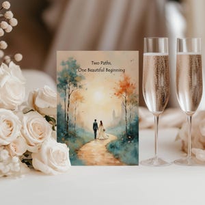 May include: A wedding card with the text "Two Paths, One Beautiful Beginning" features a watercolor painting of a couple walking on a path. Two champagne flutes filled with a bubbly beverage are on the right, and white roses are on the left.