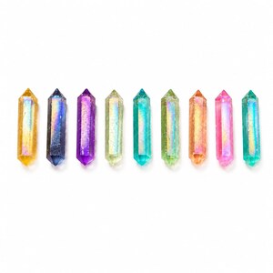 May include: A row of nine double-terminated crystal points arranged vertically. Each crystal features a distinct iridescent aura finish, displaying colors including yellow, blue, purple, light green, teal, lime green, orange, pink, and turquoise.