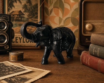 Vintage elephant figurine hand carved dark stone