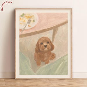 May include: A framed painting featuring a brown curly-haired dog looking upward from beneath a pink table. On the table sits a white plate with food and a silver fork. The text BARKERS & LILY is printed in red in the top left corner of the print.