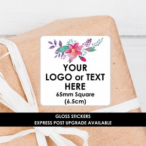 May include: Glossy square sticker featuring a watercolour floral design in shades of pink, purple, and green. The sticker has the text "YOUR LOGO or TEXT HERE 65mm Square (6.5cm)" printed in black.