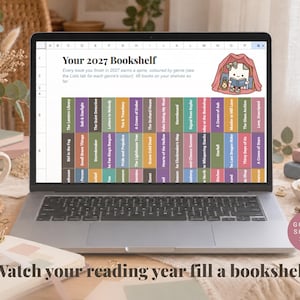 May include: A laptop screen displaying a digital 2027 bookshelf tracker in Google Sheets. The interface features a colorful grid of book spines, a header titled Your 2027 Bookshelf, and a cartoon illustration of a character reading in a tent.