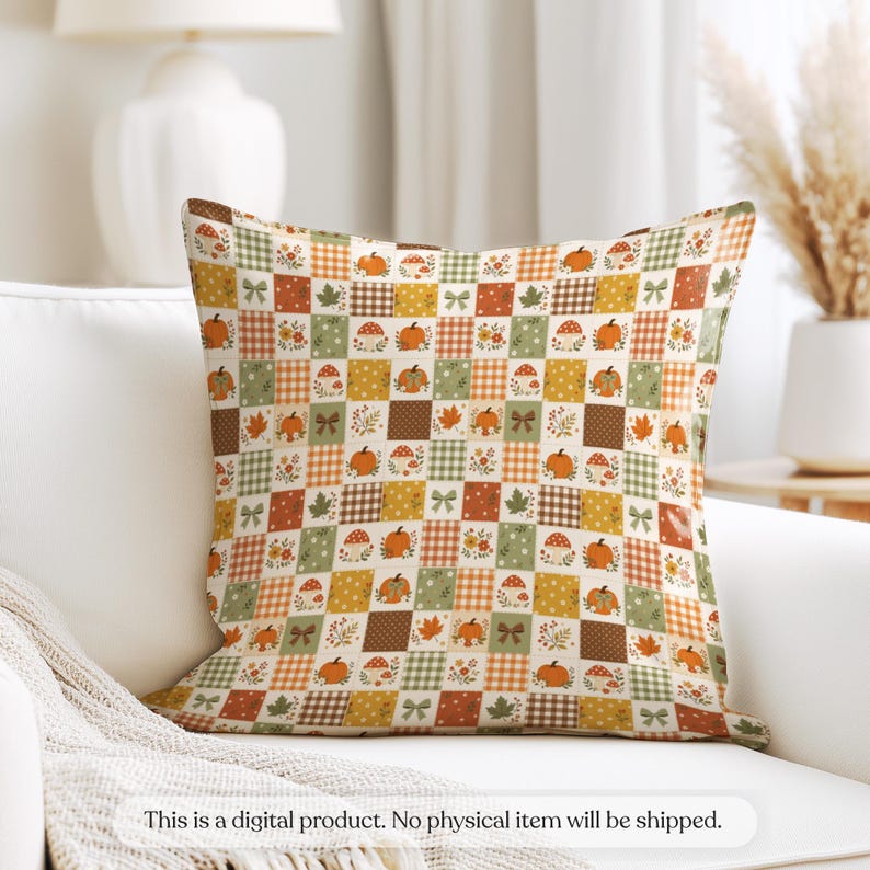 May include: A square throw pillow featuring a patchwork grid pattern with alternating squares of orange, green, and brown. The design includes illustrations of pumpkins, mushrooms, autumn leaves, small bows, and various checkered patterns.