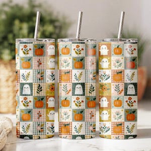 Cozy watercolor patchwork with friendly ghosts, pumpkins, gingham squares, wildflowers, and autumn foliage.