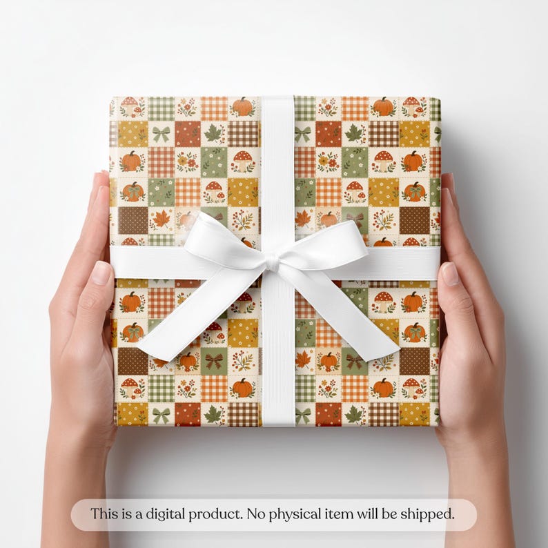 May include: A square gift box wrapped in paper with a patchwork pattern of autumn motifs including orange pumpkins, red mushrooms, green leaves, and brown gingham squares, tied with a white ribbon. Text reads: This is a digital product.