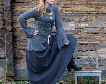 Tindra Viking woolen jumper with trumpet sleeves. Warm, light and elegant.