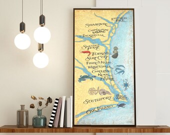 May include: A framed map print featuring a coastal region with place names like Jacksonville and Southport. The map has a yellow and blue color scheme, with illustrations of marine life. The print is displayed on a wooden shelf with decorative items.