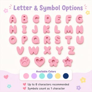 May include: A collection of pink alphabet letters from A to Z and four symbols including a paw print, heart, flower, and star. Below, a color palette displays six available options: pink, purple, teal, blue, yellow, and dark blue.
