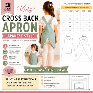 May include: A sewing pattern for a kids cross back apron in a Japanese style. The image displays a child wearing the sage green apron, a size chart in centimeters, front and back line drawings, and printing instructions with a 5x5 cm test square.