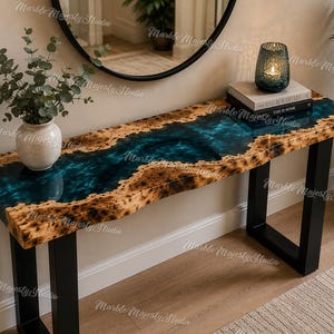 May include: A console table featuring a live-edge wood slab with a central river of translucent teal epoxy resin. The table is supported by two black metal U-shaped legs and displays a natural wood grain pattern with dark knots throughout.