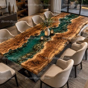 May include: A large rectangular dining table featuring a live edge wood slab with a central river design made of translucent teal resin and embedded stones, supported by a black metal base, surrounded by ten upholstered beige armchairs.