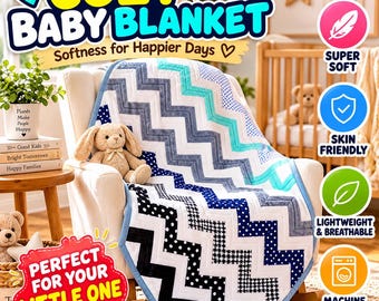 May include: A baby blanket featuring a chevron pattern in shades of blue, white, and black with polka dot accents. The blanket is draped over a chair and includes a small plush rabbit toy. Text on the image reads COZY BABY BLANKET and other labels.