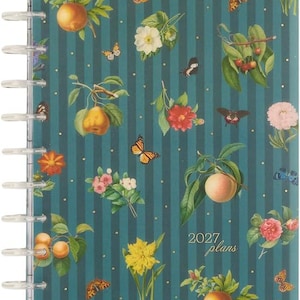 May include: A teal planner with vertical dark stripes, gold dots, and a botanical pattern featuring various fruits, flowers, and butterflies. The cover displays the text 2027 plans in gold script and features a clear plastic disc-bound spine.