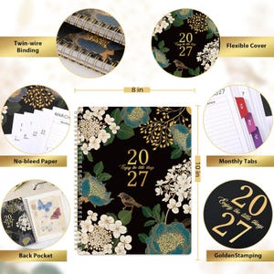 May include: A 2027 planner measuring 20.32 cm by 25.4 cm with a black cover featuring gold, white, and blue floral and bird illustrations. It includes twin-wire binding, monthly tabs, no-bleed paper, a back pocket, and golden stamping.