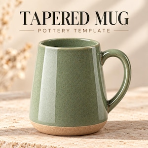 May include: A tapered mug with a speckled sage green glazed finish and a natural tan unglazed base. The text TAPERED MUG POTTERY TEMPLATE is displayed above the mug in dark brown lettering. The mug features a curved handle and a smooth surface.