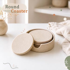 May include: A set of round, speckled beige coasters stacked inside a matching circular holder with a cutout side. The text Round Coaster is visible in the upper left corner. The coasters have a smooth, flat surface and a neutral, earthy tone.