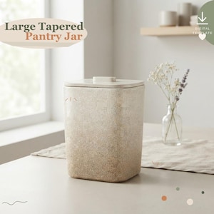 May include: A large tapered pantry jar with a speckled beige and tan finish and a flat lid. The jar features a small, subtle geometric mark near the top rim. The text "Large Tapered Pantry Jar" is visible in the upper left corner of the image.