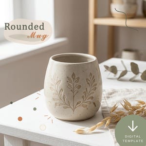 May include: A cream-colored ceramic mug with a rounded shape and a speckled finish. The exterior features an embossed botanical leaf pattern. The text "Rounded Mug" appears in the upper left corner, and a "DIGITAL TEMPLATE" icon is present.