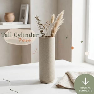 Könnte beinhalten: Eine hohe, zylindrische, gesprenkelte beige Vase mit flachem Boden, die ein getrocknetes Arrangement aus Eukalyptusblättern und Pampasgras enthält. Das Bild enthält den Text Tall Cylinder Vase und ein Symbol für digitale Vorlagen.