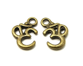 ON SALE Ohm Pendant - Om Charm - Om Pendant - Ohm Charm - Yoga Charm - Yoga Pendant - Antique Bronze Om Pendant 15 Pieces