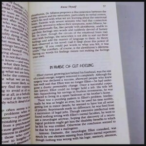 May include: An open book page with black printed text on a white background. The page header reads Know Thyself and page number 57. A section titled IN PRAISE OF GUT FEELING discusses a case study about a patient named Elliot and his tumour.