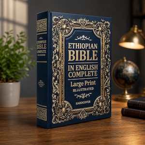 May include: A dark blue hardcover book titled Ethiopian Bible in English Complete Large Print Illustrated. The front cover features intricate gold filigree borders and decorative floral patterns surrounding the gold text. The spine also displays gold text.